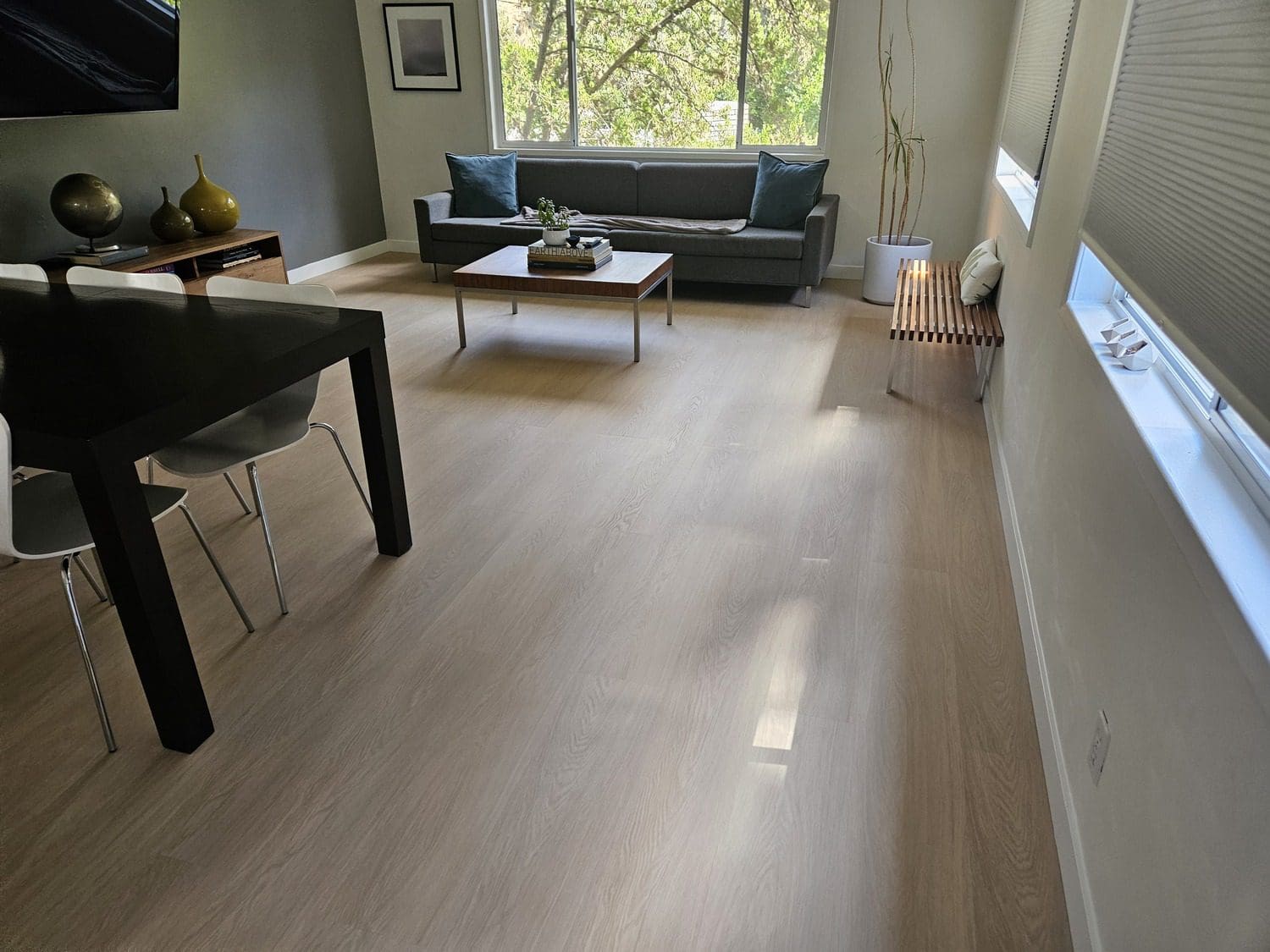 A living room with a couch and table