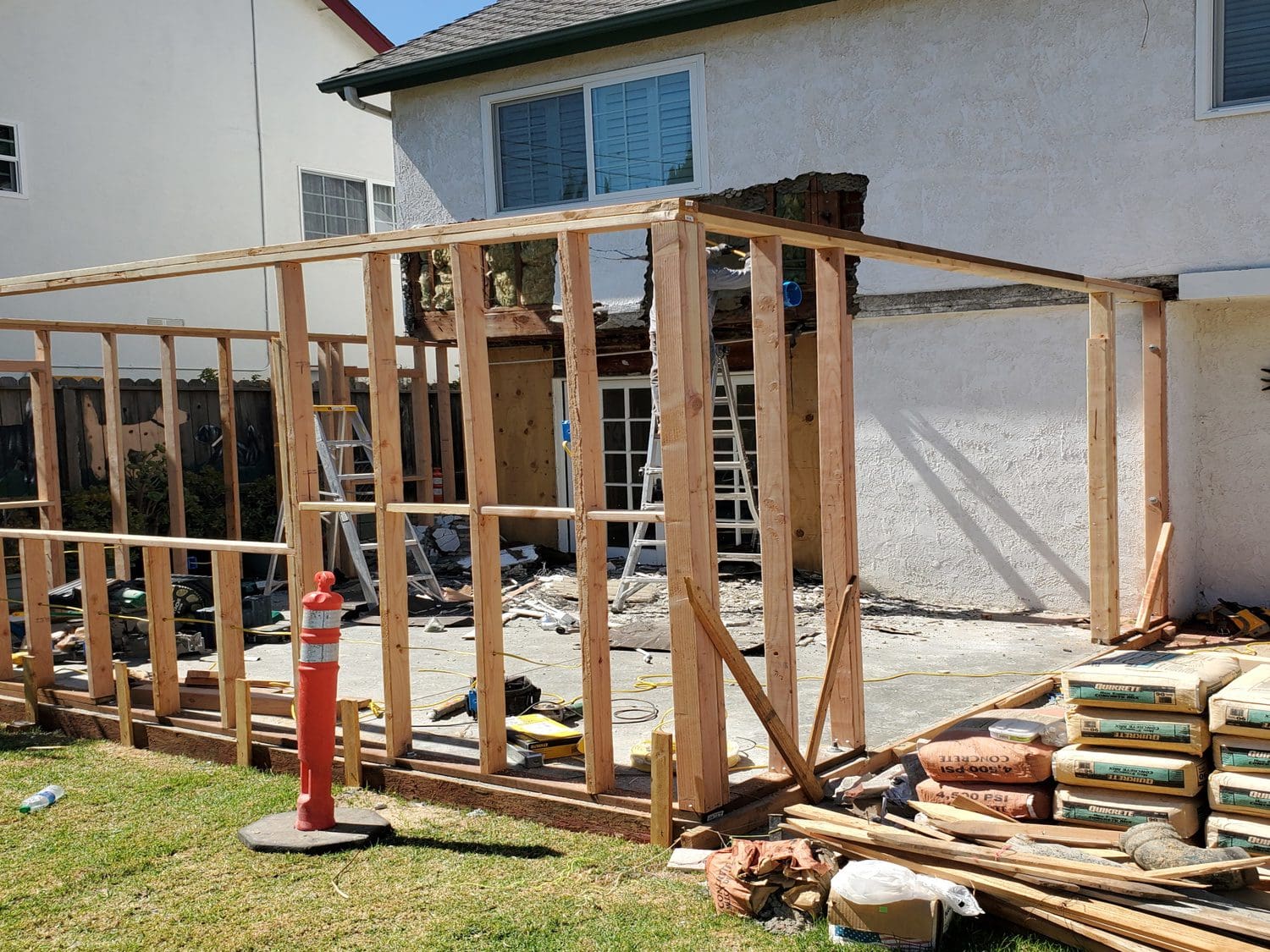 A construction site with some wood framing being built.