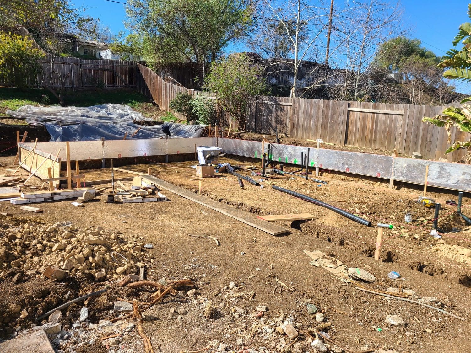 A construction site with dirt and rocks.