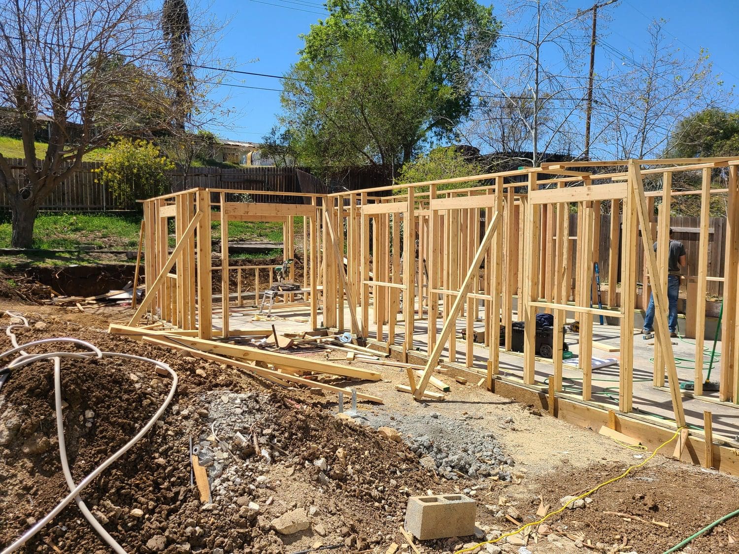 A building site with some wood being built