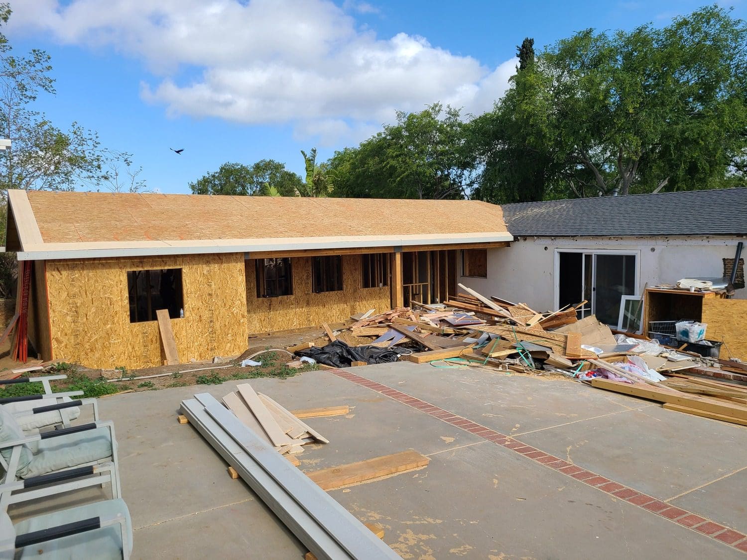 A house being built with wood and metal