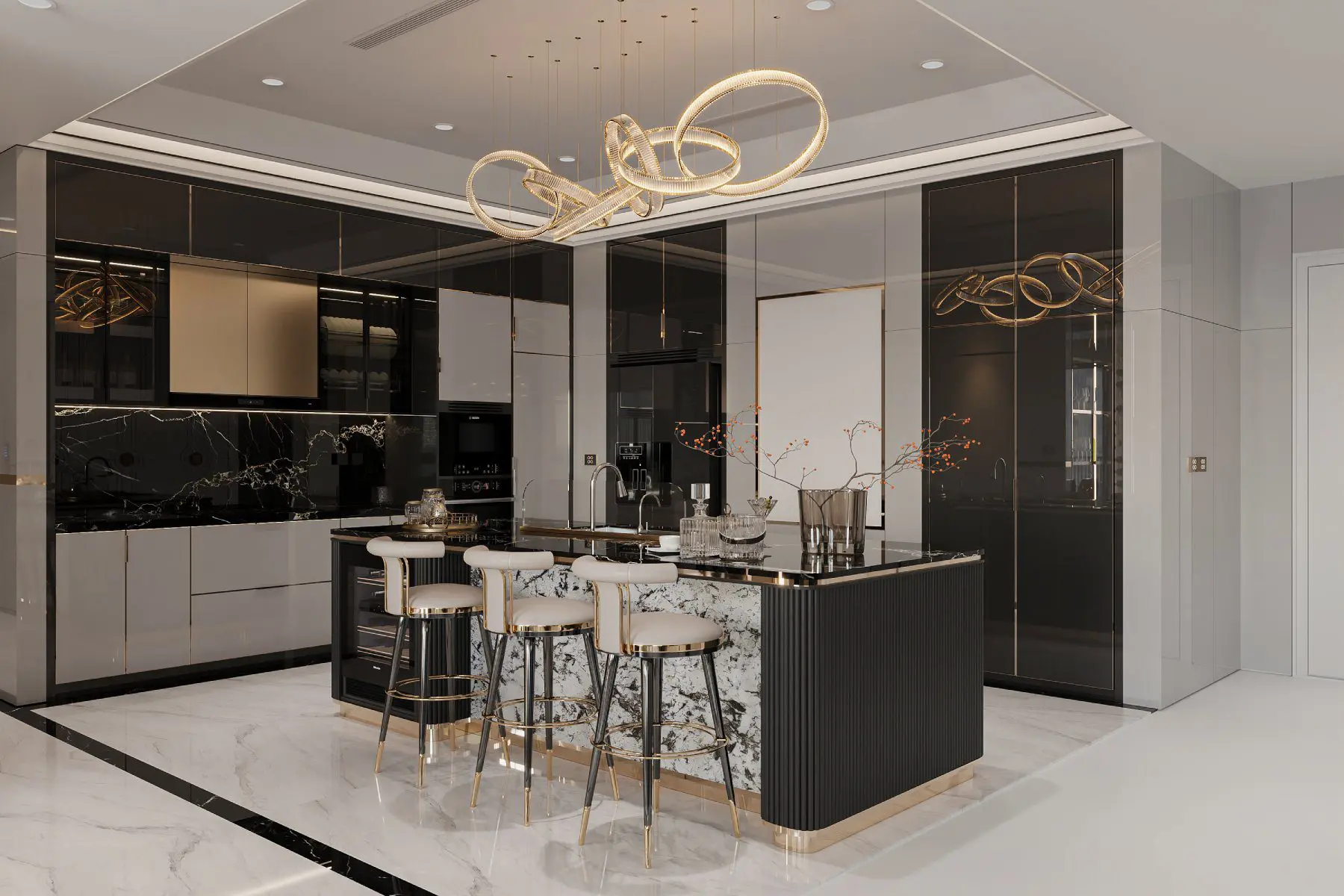 A kitchen with black and white cabinets, marble counter tops and gold accents.